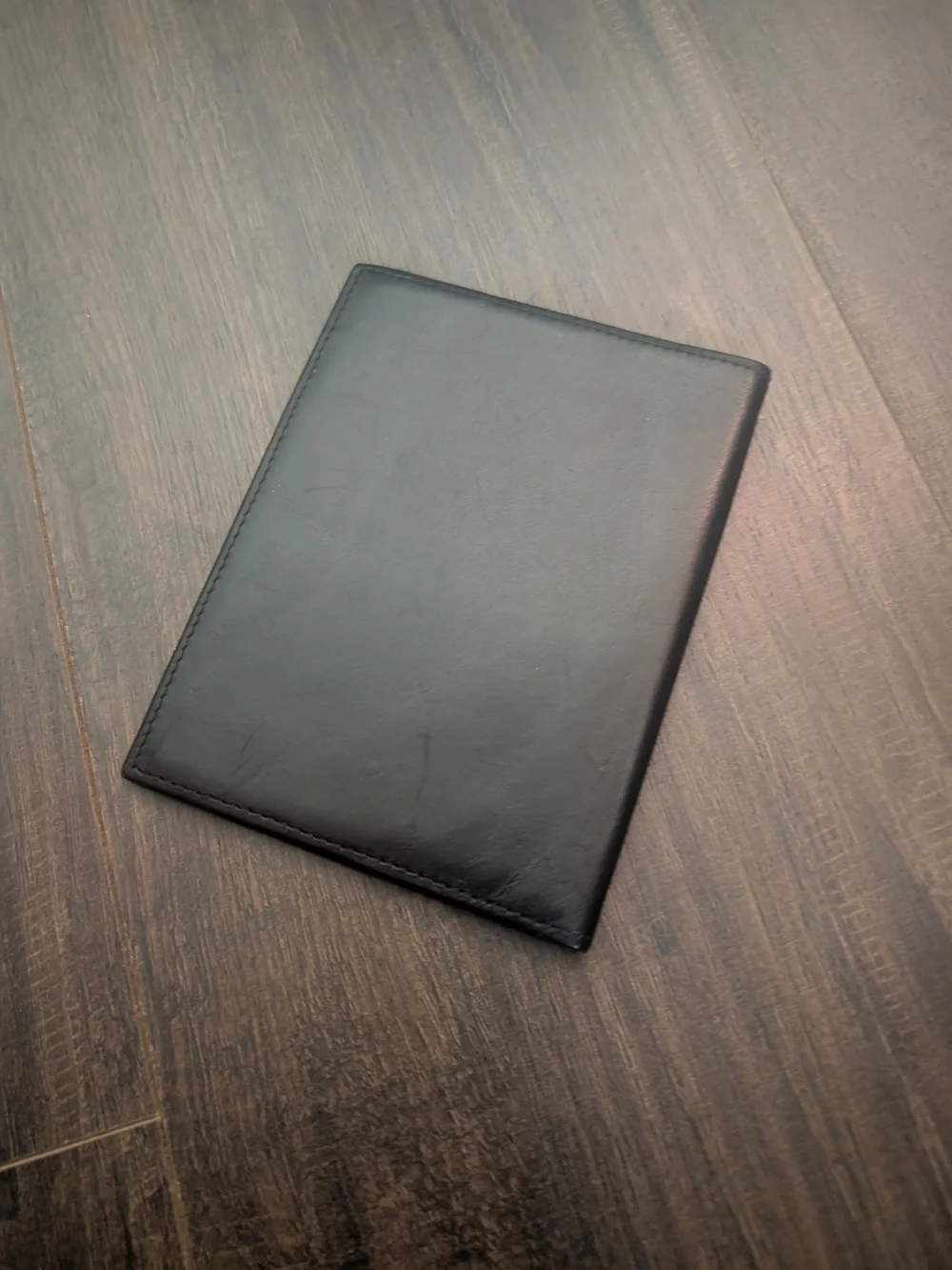 FERRARI Black Leather Passport Wallet with Embossed Shield Logo Red Inside